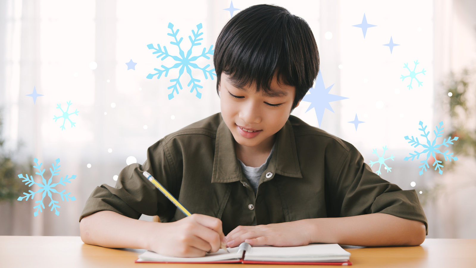 Child writing in a notebook.